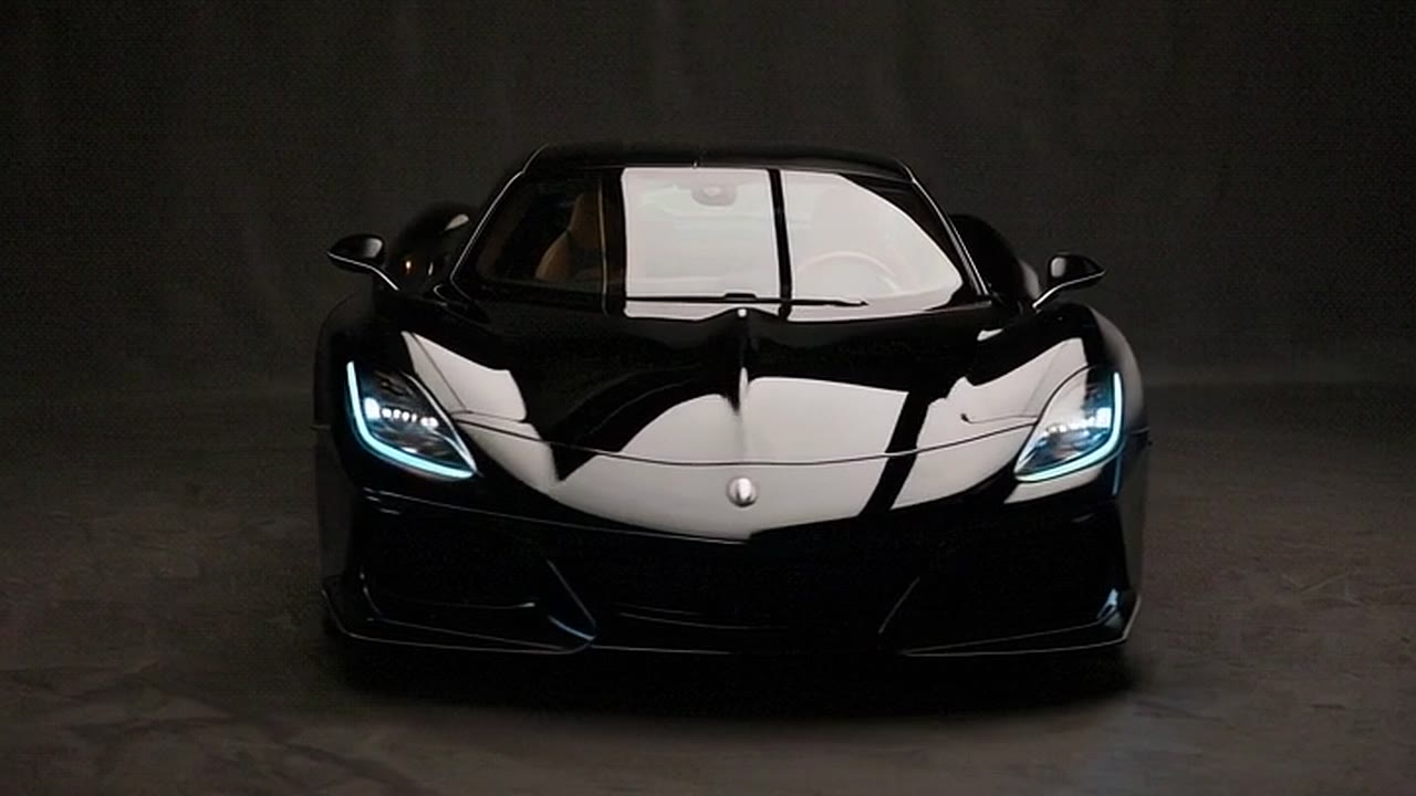 Project A28 head-on with its headlights lit