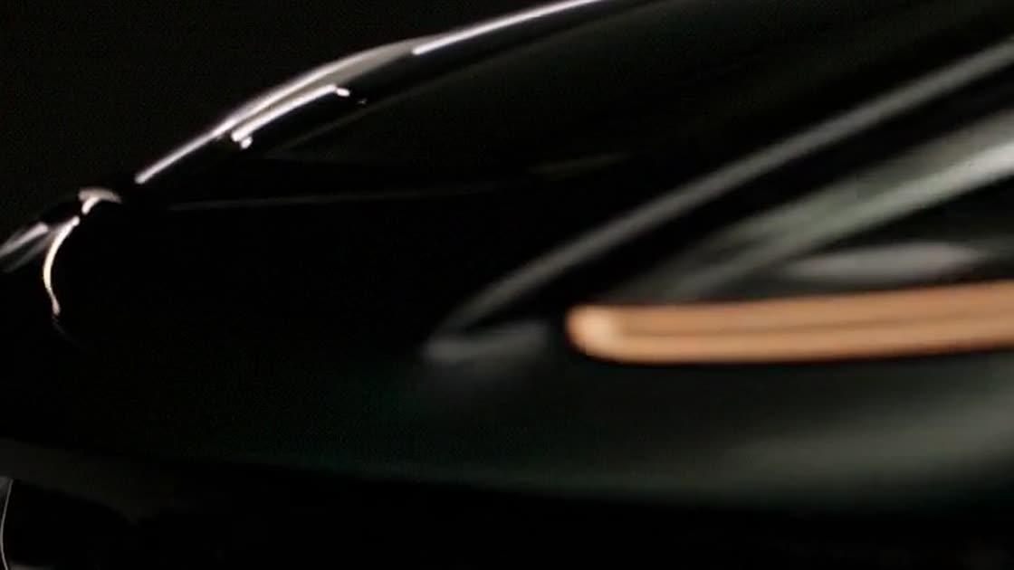 Close-up of the A28 headlight in a dark studio